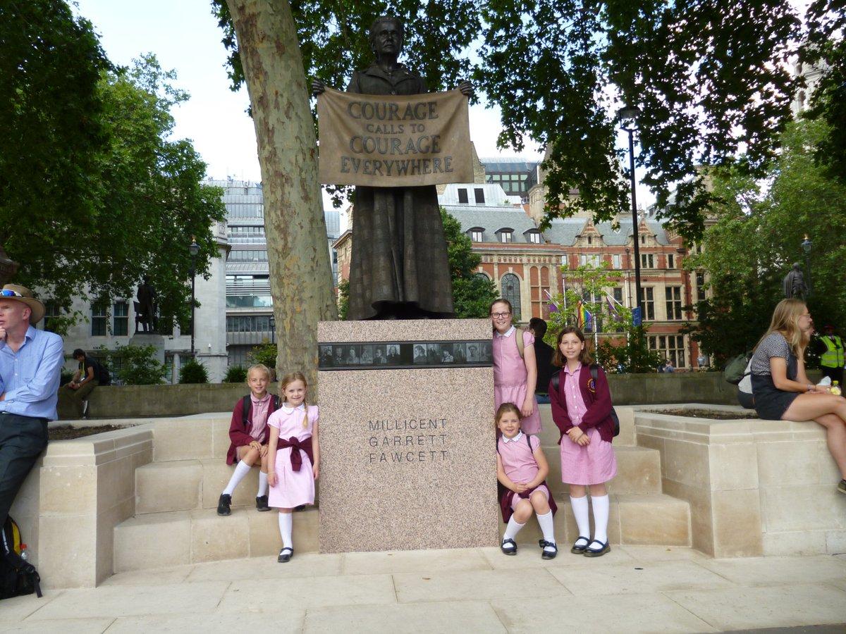 St Mary's pupils view the new Millicent Fawcett memorial before they enter Parliament